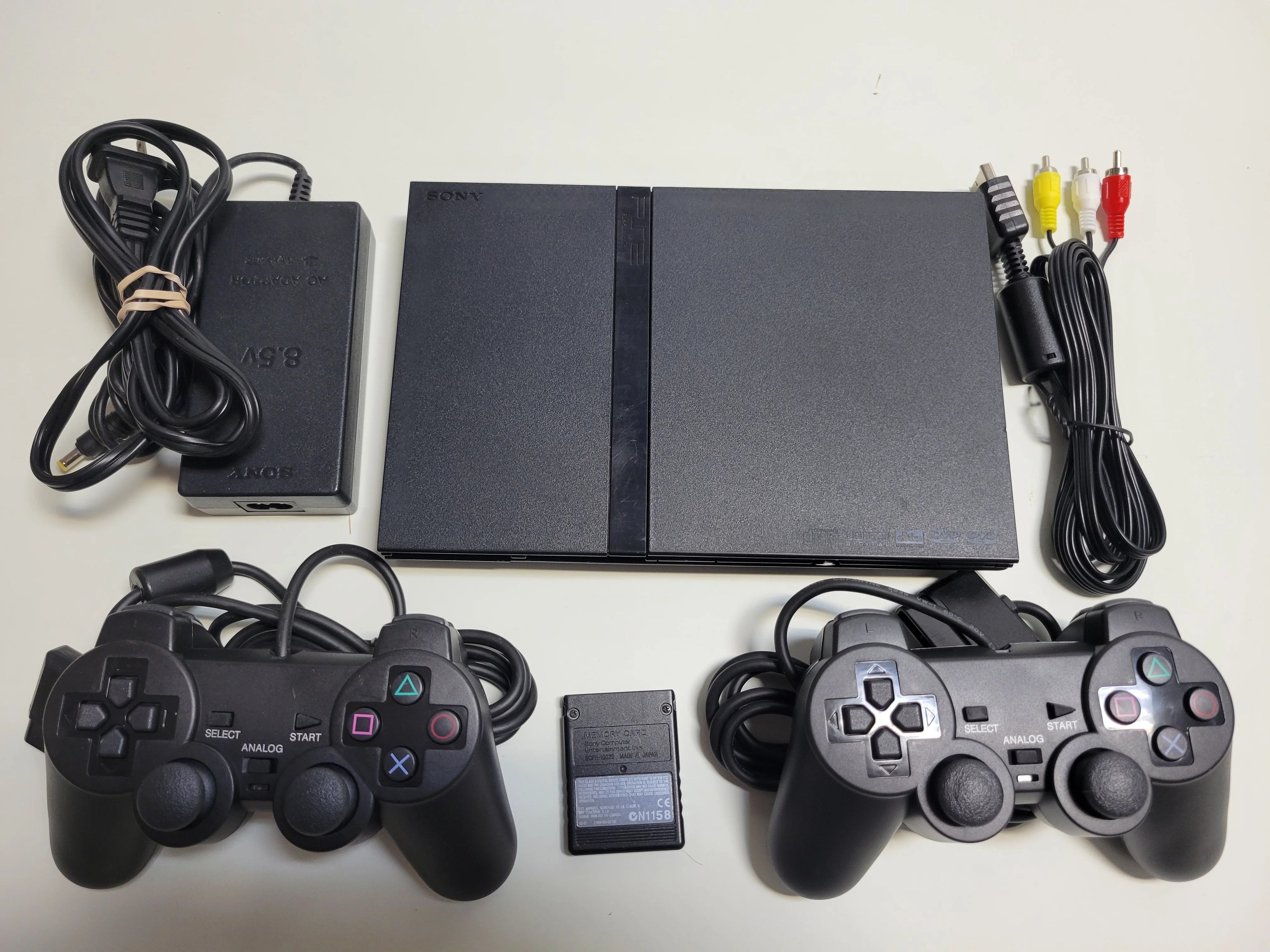 Pre-Owned Sony PlayStation 2 PS2 Slim Console with 2 Controllers X911