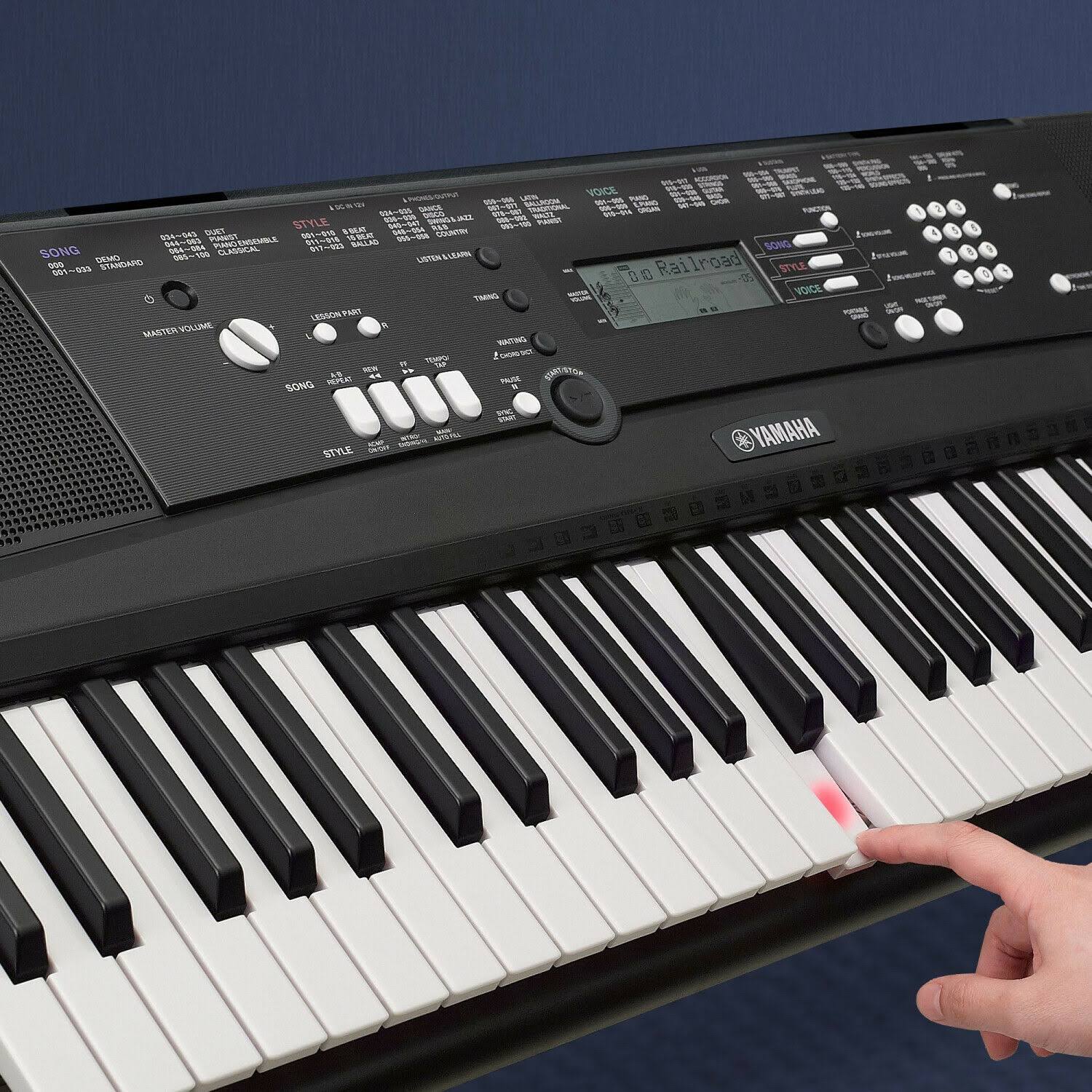 Yamaha EZ220 Keyboard with Lighted Keys, Stand and Power U4104